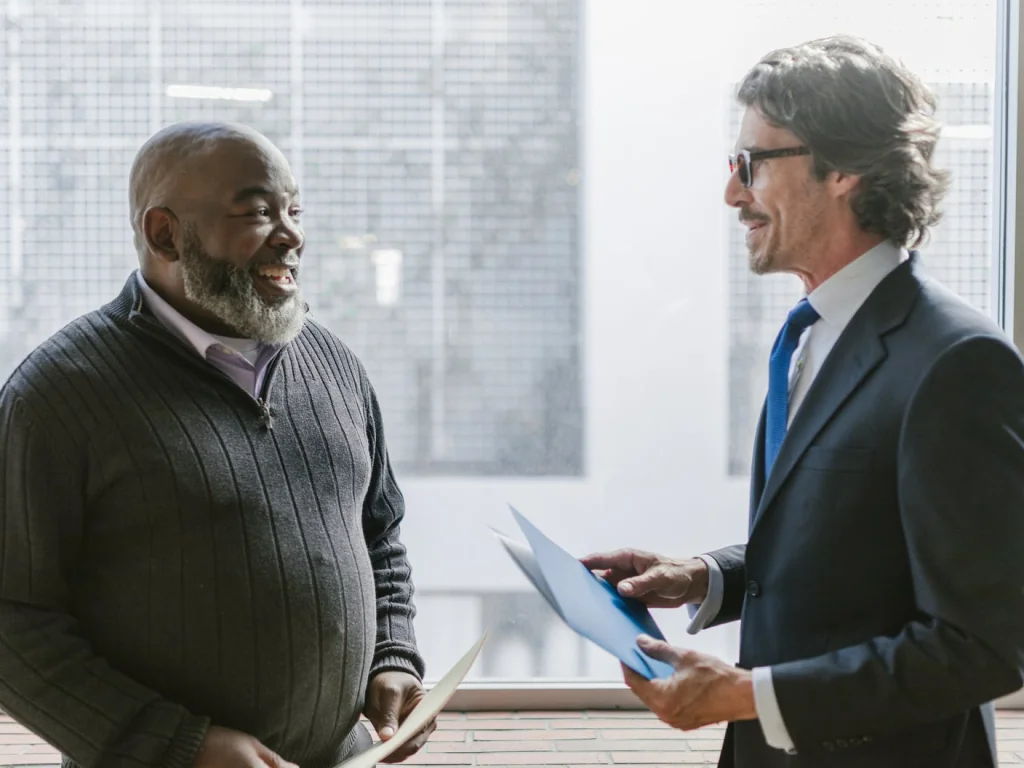 Business adviser discussing financial information with a client