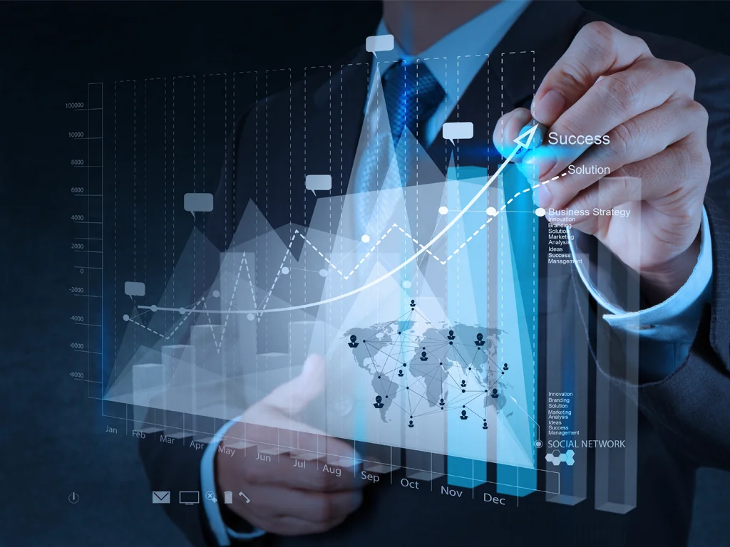 Professional reviewing business information at a computer